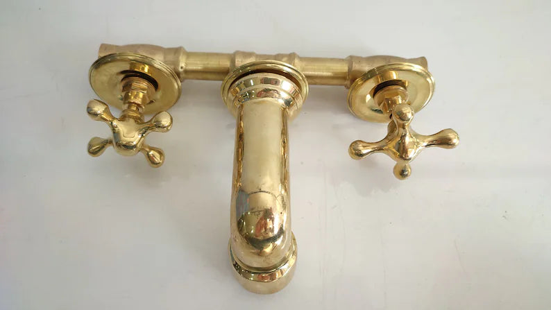 Unlacquered Brass Vintage Wall mounted bathroom faucet with gold finish & traditional handles