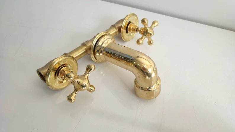 Unlacquered Brass Vintage Wall mounted bathroom faucet with gold finish & traditional handles